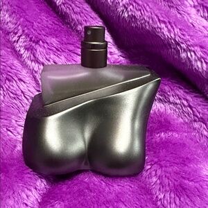 Sleek Black Perfume Bottle sprayed 1 time
